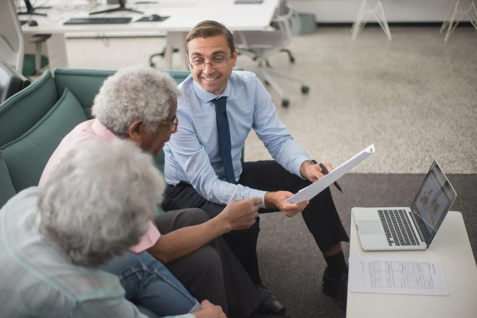 An advisor reviewing a plan with clients